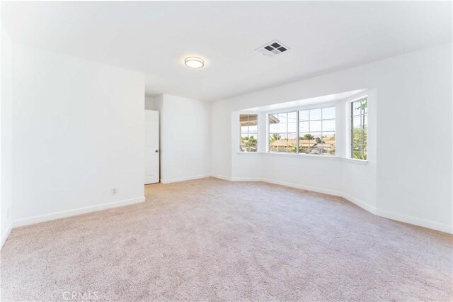 18346 Hackberry St, Hesperia, CA 92345 - empty room with carpet flooring and baseboards