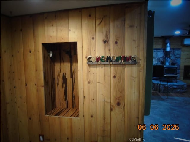 635 5th St, Willows, CA 95988 - detailed view of a wood stove, wood walls, and carpet flooring