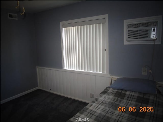 635 5th St, Willows, CA 95988 - unfurnished bedroom with a wall mounted air conditioner and carpet
