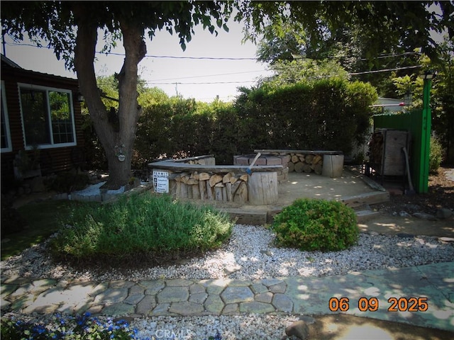 635 5th St, Willows, CA 95988 - view of patio / terrace featuring an outdoor fire pit