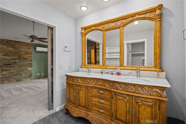 635 5th St, Willows, CA 95988 - bathroom with double vanity, an AC wall unit, and ceiling fan