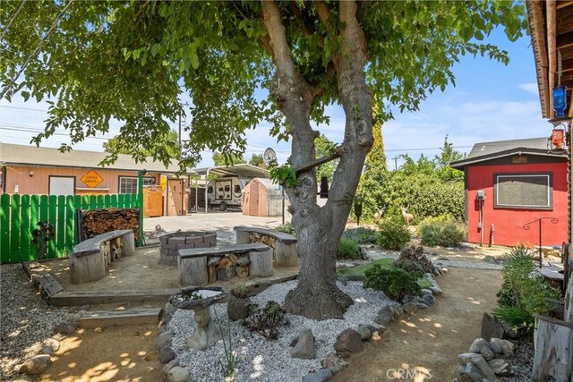 635 5th St, Willows, CA 95988 - view of yard featuring a shed and a patio