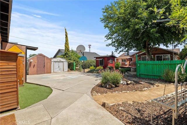 635 5th St, Willows, CA 95988 - view of front facade featuring a storage unit, a residential view, and a patio area