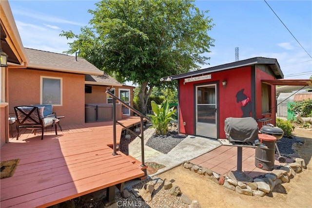 635 5th St, Willows, CA 95988 - wooden deck with an outbuilding