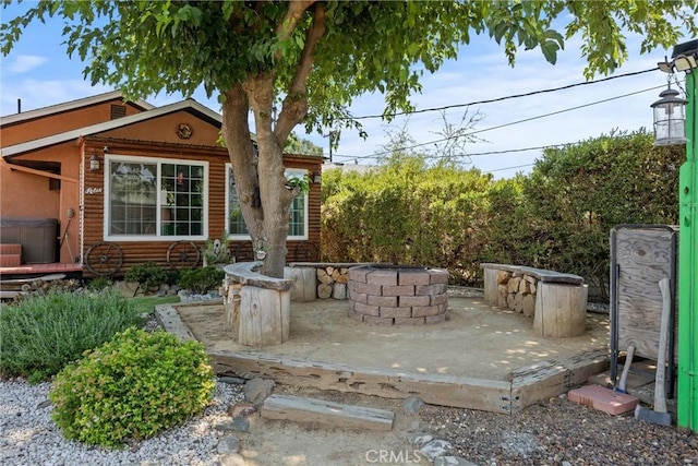 635 5th St, Willows, CA 95988 - view of patio featuring a fire pit