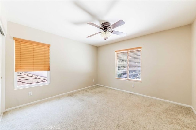 37245 La Lune Ave, Murrieta, CA 92563 - empty room with light carpet, a ceiling fan, and baseboards