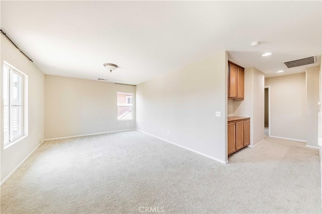 37245 La Lune Ave, Murrieta, CA 92563 - empty room featuring baseboards, light colored carpet, and a smoke detector
