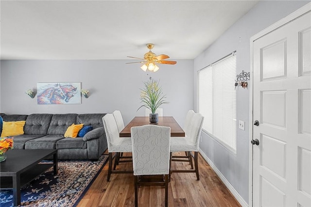 2061 Locust Ct, San Bernardino, CA 92404 - dining space with wood finished floors, ceiling fan, and baseboards