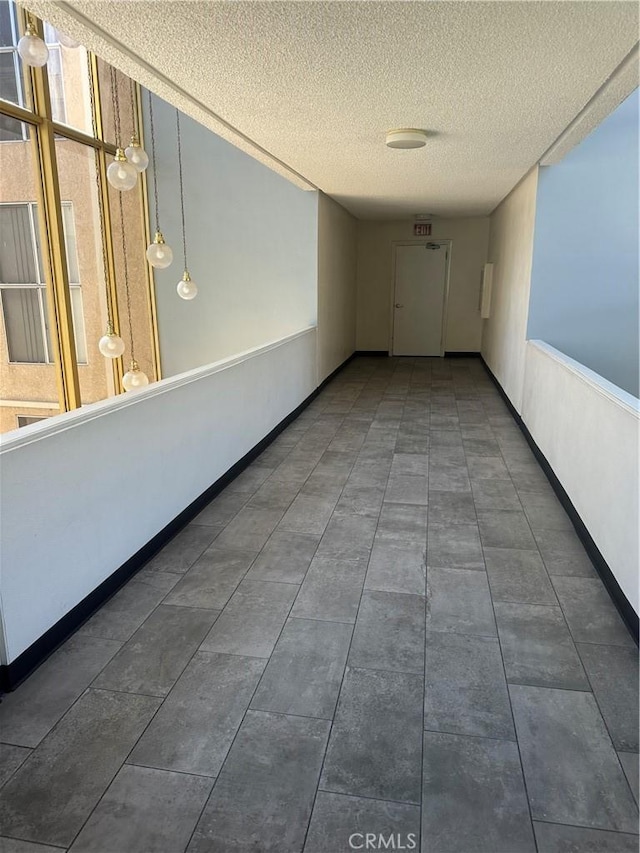 5429 Newcastle Ave Unit 206, Encino, CA 91316 - hall with a textured ceiling