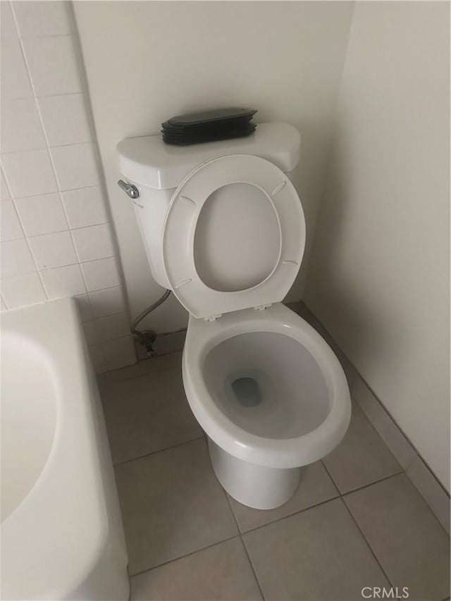 5429 Newcastle Ave Unit 206, Encino, CA 91316 - bathroom with toilet and tile patterned flooring