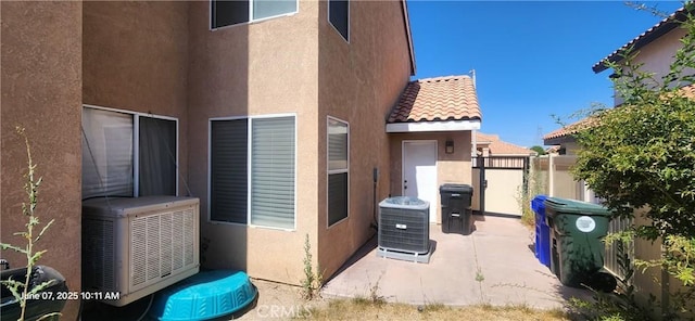 12609 Gentle Breeze Way, Victorville, CA 92392 - view of patio / terrace featuring central air condition unit