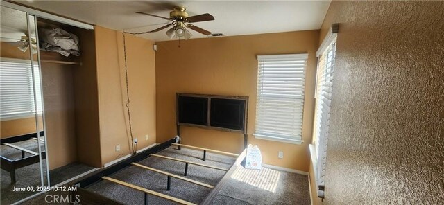 12609 Gentle Breeze Way, Victorville, CA 92392 - stairs with a ceiling fan