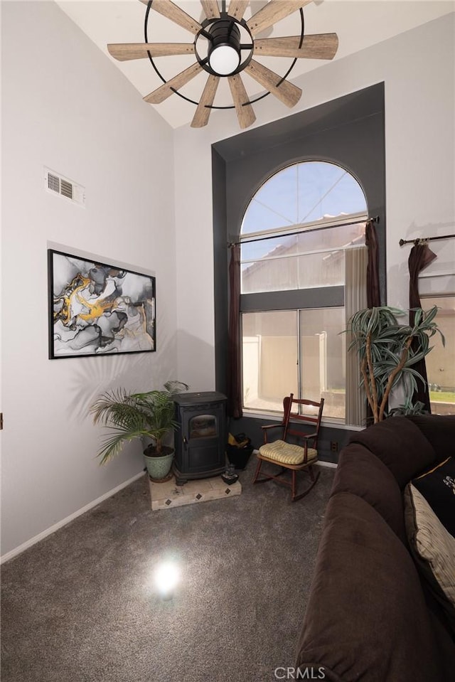12609 Gentle Breeze Way, Victorville, CA 92392 - living room with a wood stove and ceiling fan