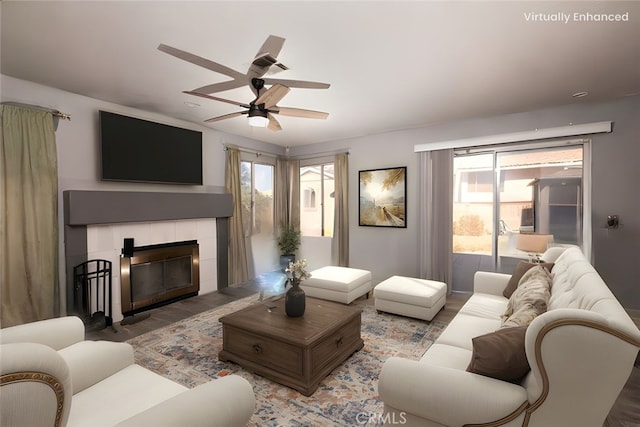 12609 Gentle Breeze Way, Victorville, CA 92392 - living area featuring ceiling fan, wood finished floors, and a tile fireplace