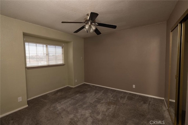 12609 Gentle Breeze Way, Victorville, CA 92392 - unfurnished room with dark colored carpet, ceiling fan, and a textured ceiling