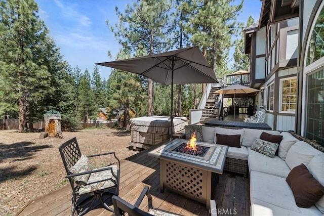 114 Starvation Flats Rd, Big Bear Lake, CA 92315 - deck featuring an outdoor living space with a fire pit and a hot tub