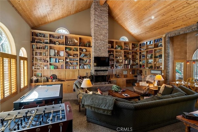 114 Starvation Flats Rd, Big Bear Lake, CA 92315 - living room featuring high vaulted ceiling, built in shelves, wooden ceiling, a fireplace, and carpet flooring