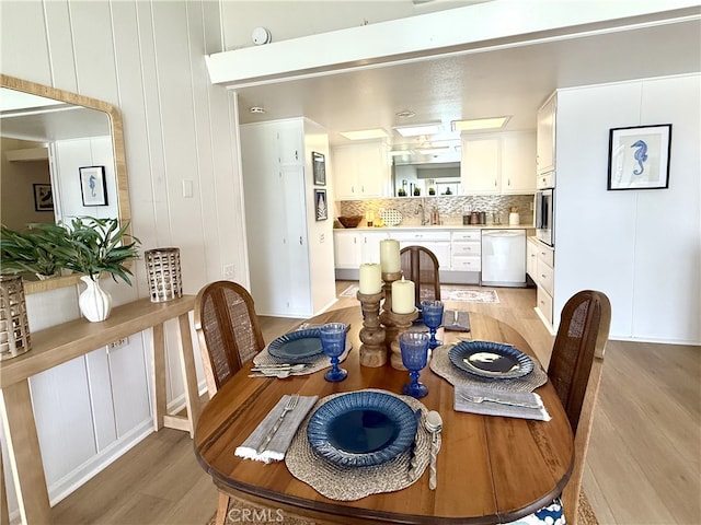 1533 Merion Way Unit 26K, Seal Beach, CA 90740 - dining space with light wood finished floors