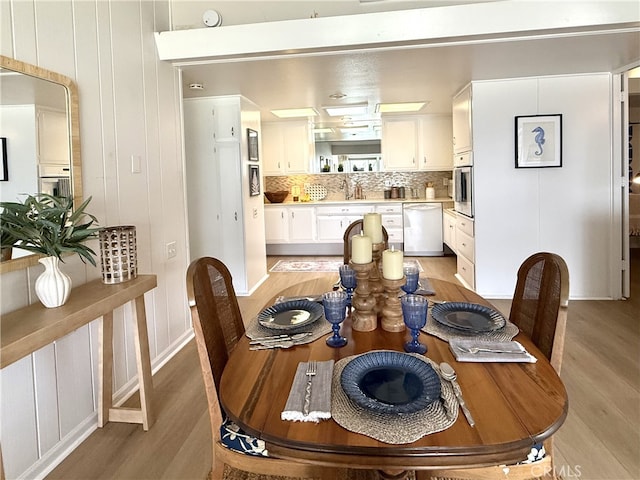1533 Merion Way Unit 26K, Seal Beach, CA 90740 - dining room featuring light wood-style floors