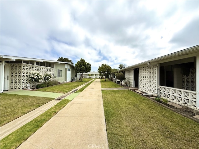1533 Merion Way Unit 26K, Seal Beach, CA 90740 - view of green lawn