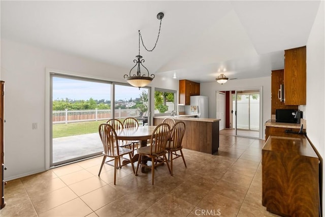 26231 Avenida Calidad, Mission Viejo, CA 92691 - dining space with lofted ceiling and light tile patterned floors