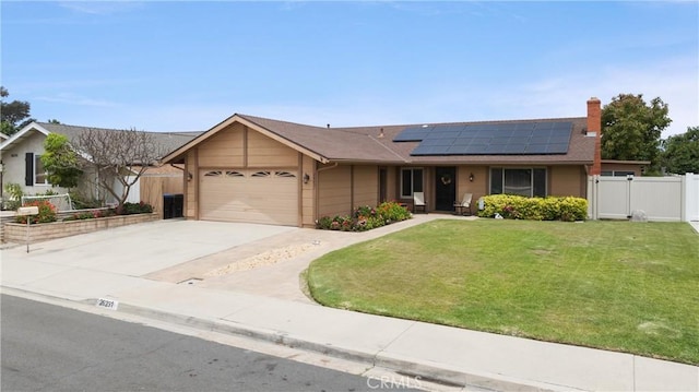 26231 Avenida Calidad, Mission Viejo, CA 92691 - ranch-style house with a garage, solar panels, a gate, concrete driveway, and a chimney