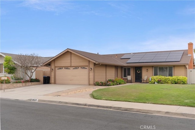 26231 Avenida Calidad, Mission Viejo, CA 92691 - single story home with roof mounted solar panels, a garage, driveway, roof with shingles, and a chimney