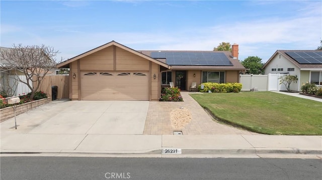26231 Avenida Calidad, Mission Viejo, CA 92691 - ranch-style home featuring solar panels, driveway, a garage, and a chimney
