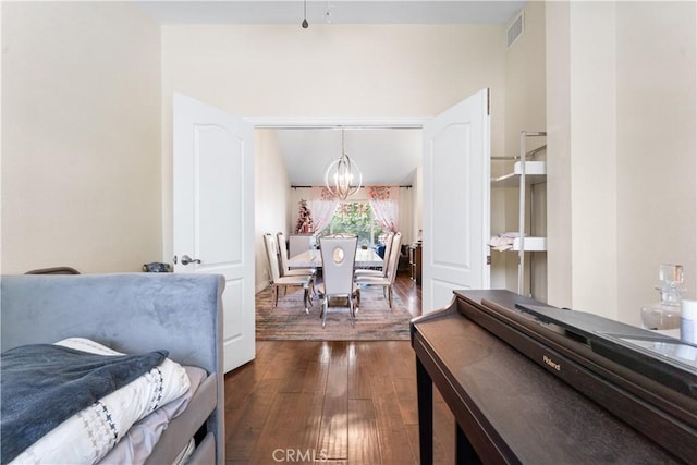 3372 Buckingham Rd, Chino Hills, CA 91709 - dining space with a chandelier and dark wood-style flooring