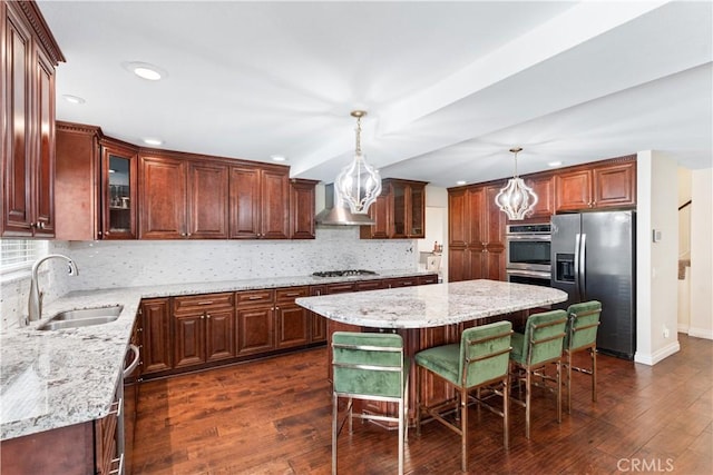 3372 Buckingham Rd, Chino Hills, CA 91709 - kitchen with stainless steel appliances, dark wood finished floors, wall chimney exhaust hood, recessed lighting, and a chandelier