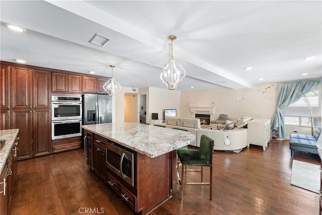 3372 Buckingham Rd, Chino Hills, CA 91709 - kitchen featuring stainless steel appliances, dark wood finished floors, light stone countertops, and recessed lighting