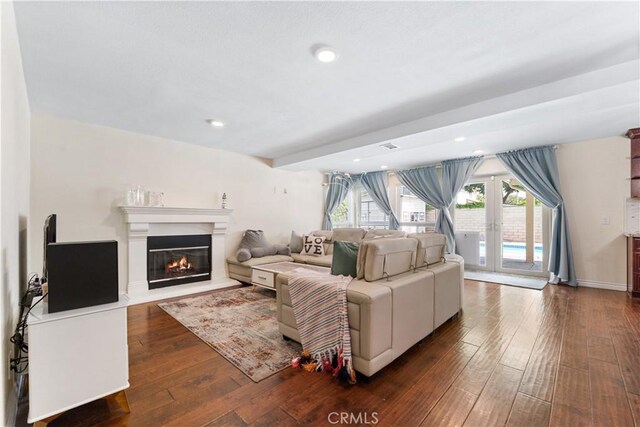 3372 Buckingham Rd, Chino Hills, CA 91709 - living room with french doors, a glass covered fireplace, dark wood-type flooring, and recessed lighting