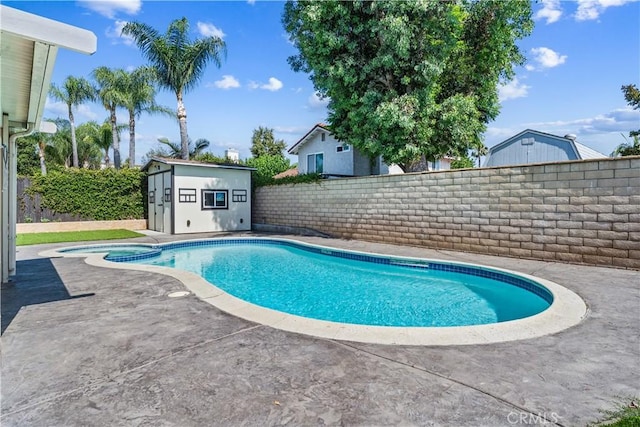 3372 Buckingham Rd, Chino Hills, CA 91709 - view of pool with a fenced backyard, a storage shed, a pool with connected hot tub, and a patio area