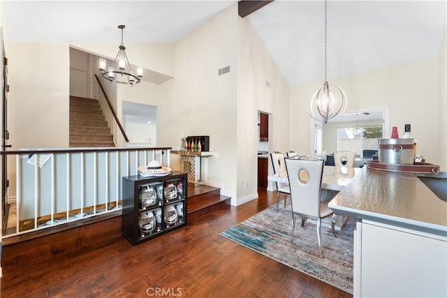3372 Buckingham Rd, Chino Hills, CA 91709 - dining area with a chandelier, high vaulted ceiling, hardwood / wood-style flooring, and stairs