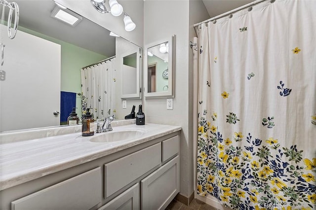 7669 Granby Ave, Rancho Cucamonga, CA 91730 - bathroom with vanity, curtained shower, and tile patterned floors