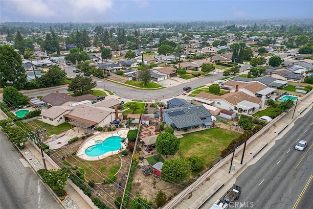 7669 Granby Ave, Rancho Cucamonga, CA 91730 - aerial perspective of suburban area with a pool area