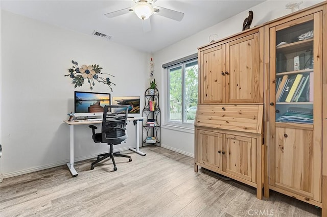 7669 Granby Ave, Rancho Cucamonga, CA 91730 - office area featuring light wood finished floors, ceiling fan, and baseboards