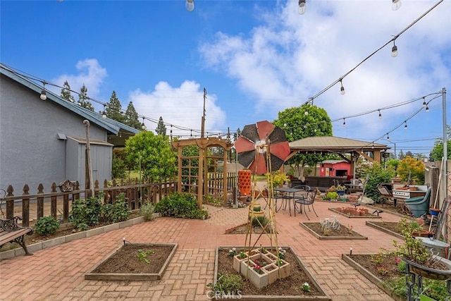 7669 Granby Ave, Rancho Cucamonga, CA 91730 - fenced backyard featuring a gazebo, a garden, and a patio area