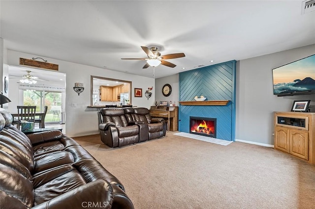7669 Granby Ave, Rancho Cucamonga, CA 91730 - carpeted living room featuring a ceiling fan, baseboards, recessed lighting, and a fireplace