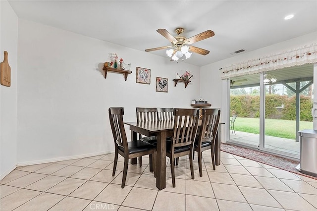 7669 Granby Ave, Rancho Cucamonga, CA 91730 - dining area featuring ceiling fan, light tile patterned flooring, and baseboards