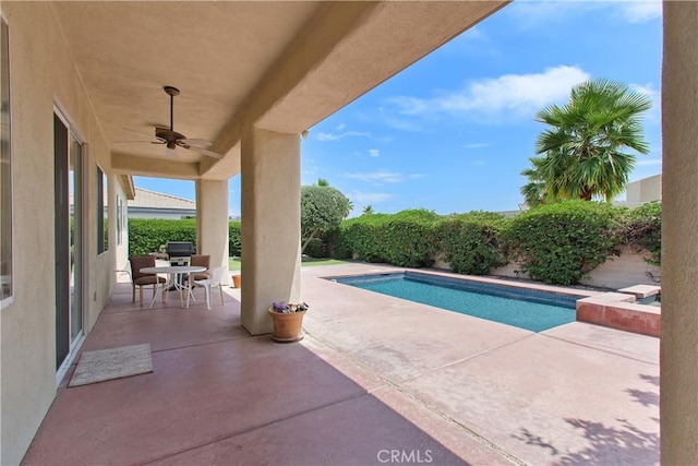 69635 Valle De Costa, Cathedral City, CA 92234 - view of swimming pool featuring a ceiling fan, a patio, and outdoor dining space