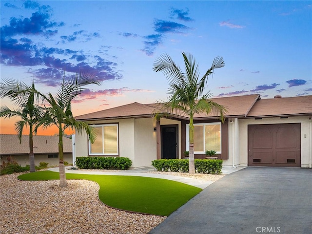 4735 Sunny Hills Rd, Oceanside, CA 92056 - single story home featuring stucco siding, an attached garage, and driveway