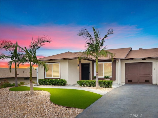4735 Sunny Hills Rd, Oceanside, CA 92056 - single story home with a garage, stucco siding, and asphalt driveway
