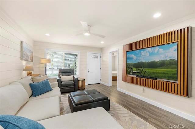 4735 Sunny Hills Rd, Oceanside, CA 92056 - living room featuring wood finished floors, recessed lighting, wooden walls, a ceiling fan, and baseboards