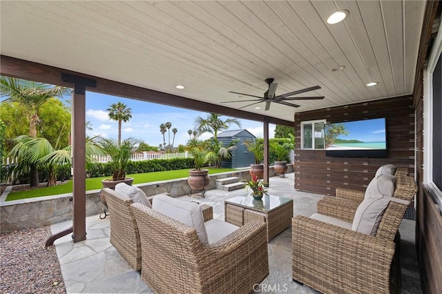 4735 Sunny Hills Rd, Oceanside, CA 92056 - fenced backyard with a patio area, outdoor lounge area, and ceiling fan