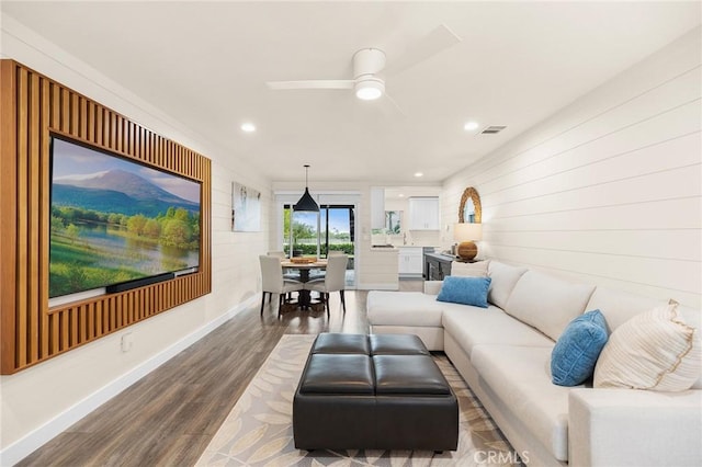 4735 Sunny Hills Rd, Oceanside, CA 92056 - living room featuring wood finished floors, wood walls, recessed lighting, baseboards, and ceiling fan