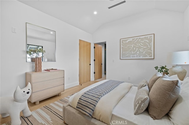 721 Wilson Ct, Burbank, CA 91501 - bedroom with lofted ceiling, wood finished floors, and recessed lighting