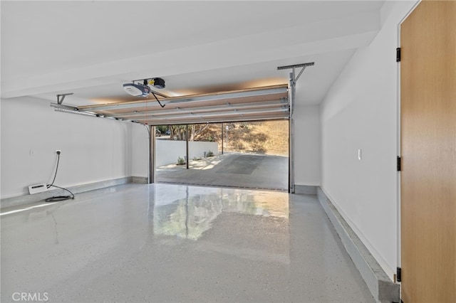 721 Wilson Ct, Burbank, CA 91501 - garage featuring a garage door opener and baseboards