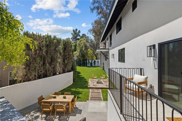721 Wilson Ct, Burbank, CA 91501 - view of patio featuring stairway, a balcony, and outdoor dining area