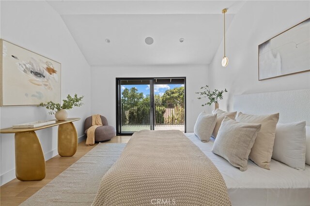 721 Wilson Ct, Burbank, CA 91501 - bedroom featuring access to exterior, wood finished floors, and high vaulted ceiling